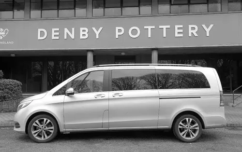 A Mercedes V-Class waiting in a car park